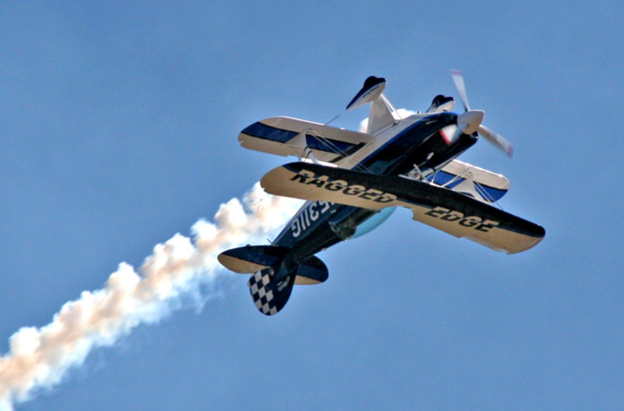 Maj. Jill Long, an instructor with the 89th Flying Training Squadron, takes her Pitts S2B for a spin.  Major Long performs in air shows around the country in her free time, and will perform at Sheppard's air show Oct. 20.  (Photo courtesy of Major Long)