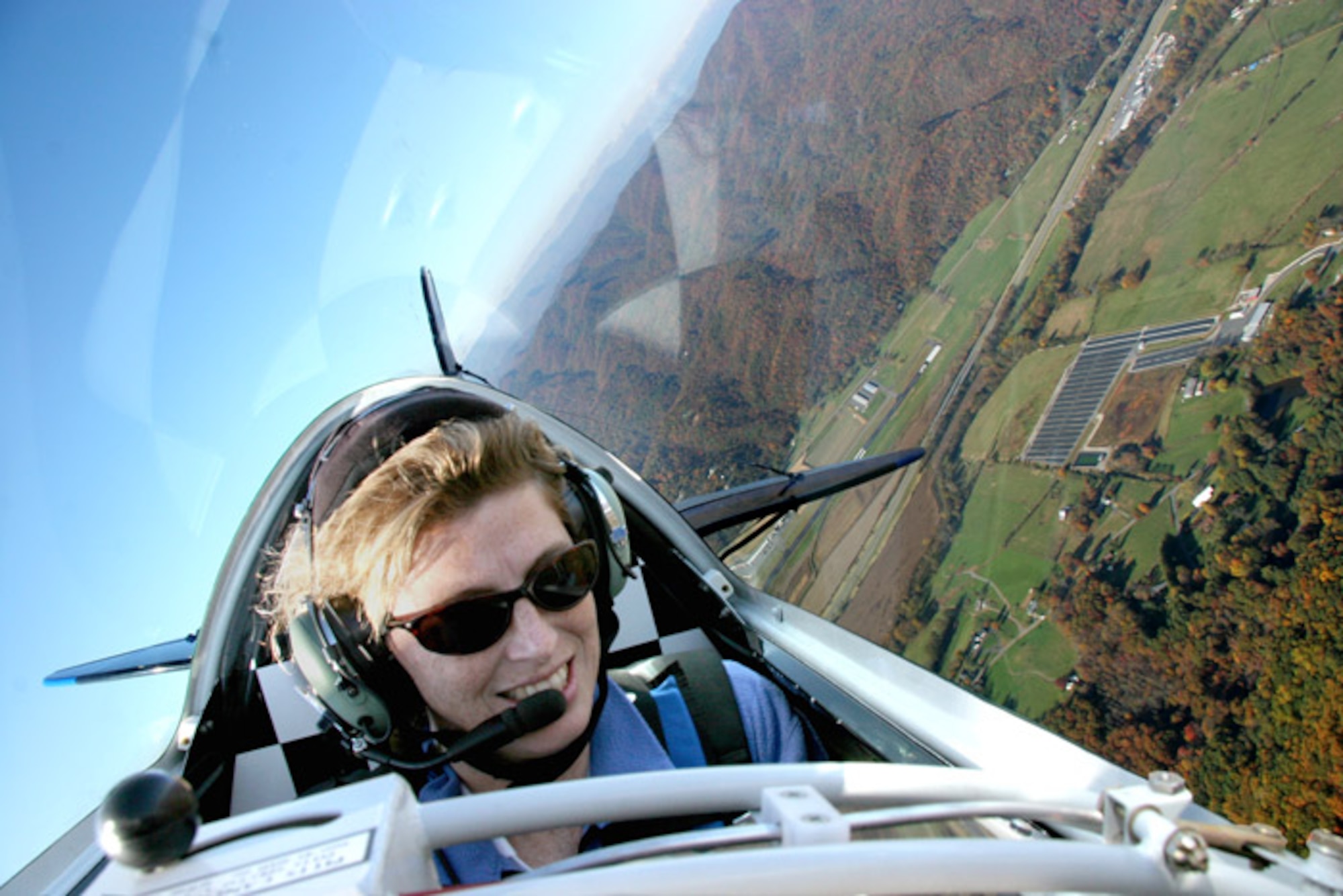 Maj. Jill Long, an instructor with the 89th Flying Training Squadron, takes her personal plane, a Pitts S2B, for a joyride.  Major Long performs in air shows around the country in her free time, and will perform at Sheppard's air show Oct. 20.  (Photo courtesy of Major Long)