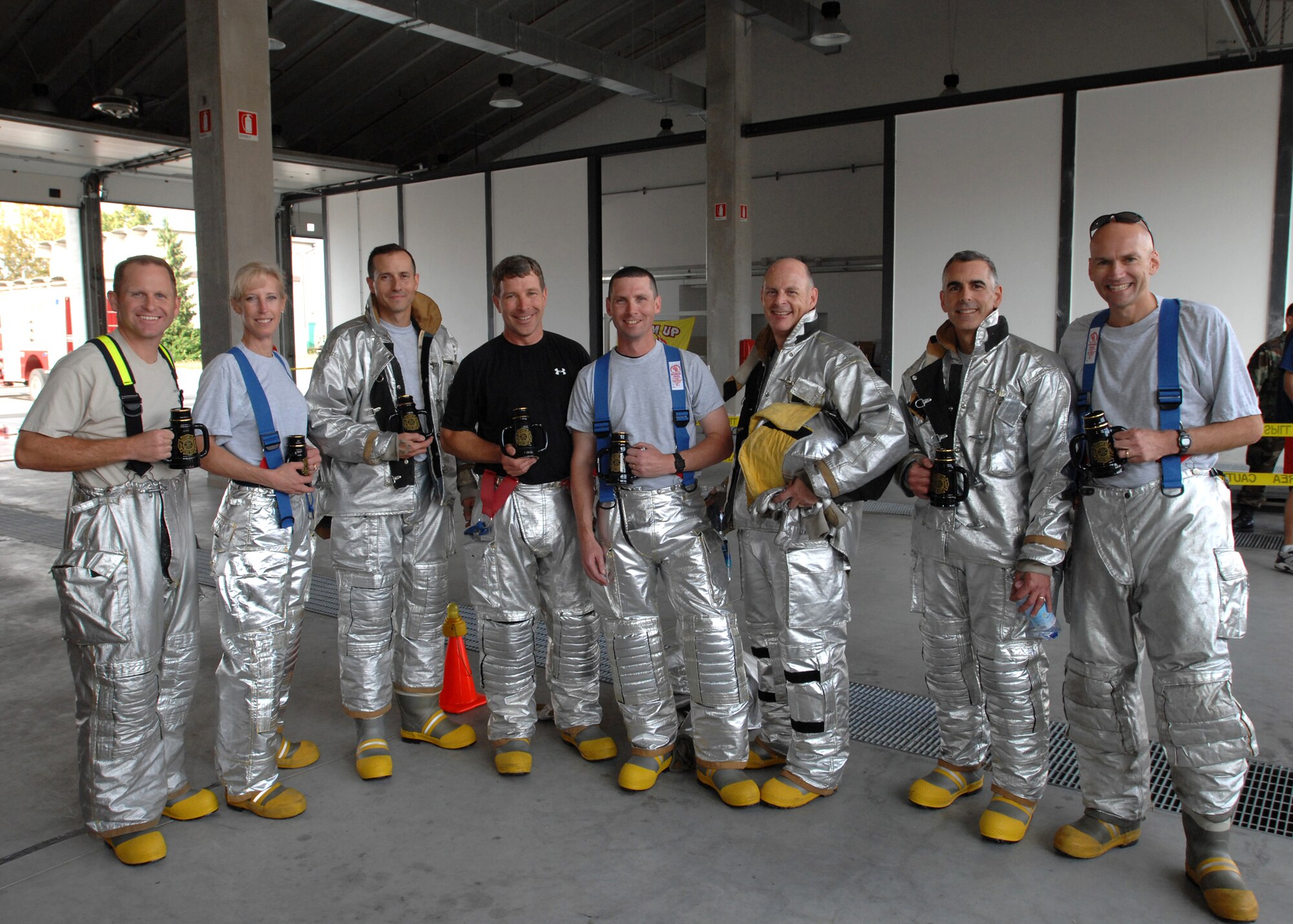 AVIANO AIR BASE, Italy-- Group and squadron commanders compete in the Commander's Firefighter's Challenge Oct. 12, 2007.  Airmen celebrated Fire Safety Week by competing in various firefighting obstacle courses.  (U.S. Air Force photo by Airman 1st Class Nathan Doza)  