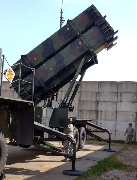 KUNSAN AIR BASE, South Korea -- Army Sergeant Frank Tatroe, a launcher crew member with Charlie 2-1 Air Defense Artillery, operates the PATRIOT launcher system with the Launch Control Unit as part of a training exercise here Oct. 19.  The Soldiers of Charlie 2-1 ADA here provide missile defense for the 8th Fighter Wing so runways can remain operational at all times. (U.S. Air Force photo/Senior Airman Steven R. Doty)