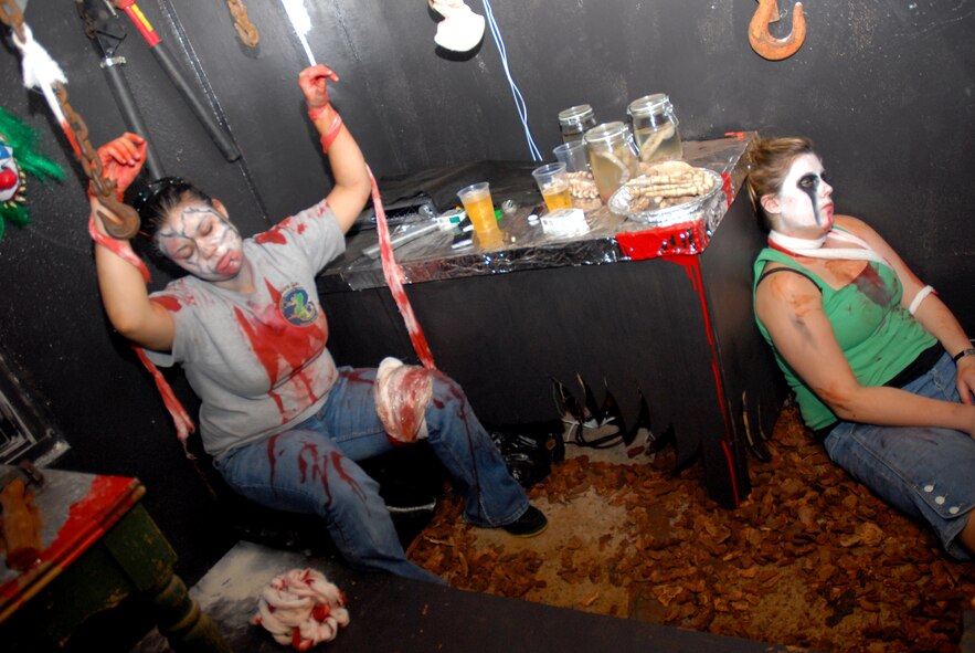 Navy volunteers participate in the 36th Civil Engineering Squadron's haunted house in base housing Oct. 19.  (U.S. Air Force photo/Senior Airman Miranda Moorer)
