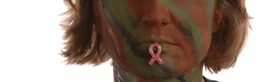 Capt. Kimberly Peters, 23rd Wing protocol officer, sports a pink ribbon on her lips to promote awareness of breast cancer in the military. (U.S. Air Force photo by Airman 1st Class Brittany Barker) 