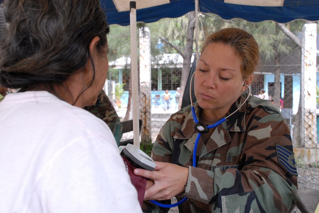 CUESTA DE LA VIRGEN, Honduras -- Air Force Tech. Sgt. Diane Strohm, Joint Task Force-Bravo Medical Element emergency medical technician, takes the blood pressure of a Honduran villager here Oct. 19.  This MEDRETE educated 785 Hondurans on preventive medicine issues such as hand washing, food preparation and personal hygiene.  Of those 785, doctors examined 352 patients and the dentist treated 139 patients. (U.S. Air Force photo/Tech. Sgt. Sonny Cohrs)