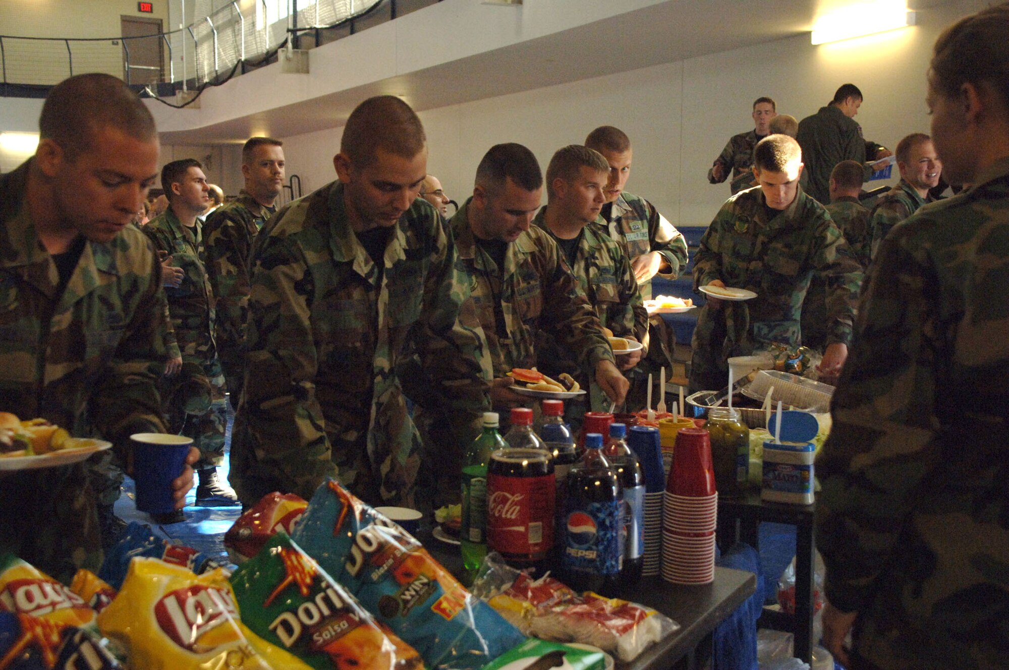 Airmen enjoyed a burger burn and a chance to contribute to the 2007 Combined Federal Campaign Oct. 18 at the CFC kick off party. Holloman Airmen and civil employees will be able to contribute to the campaign until Nov. 28. (U.S. Air Force photo/Airman 1st Class Tiffany Trojca)