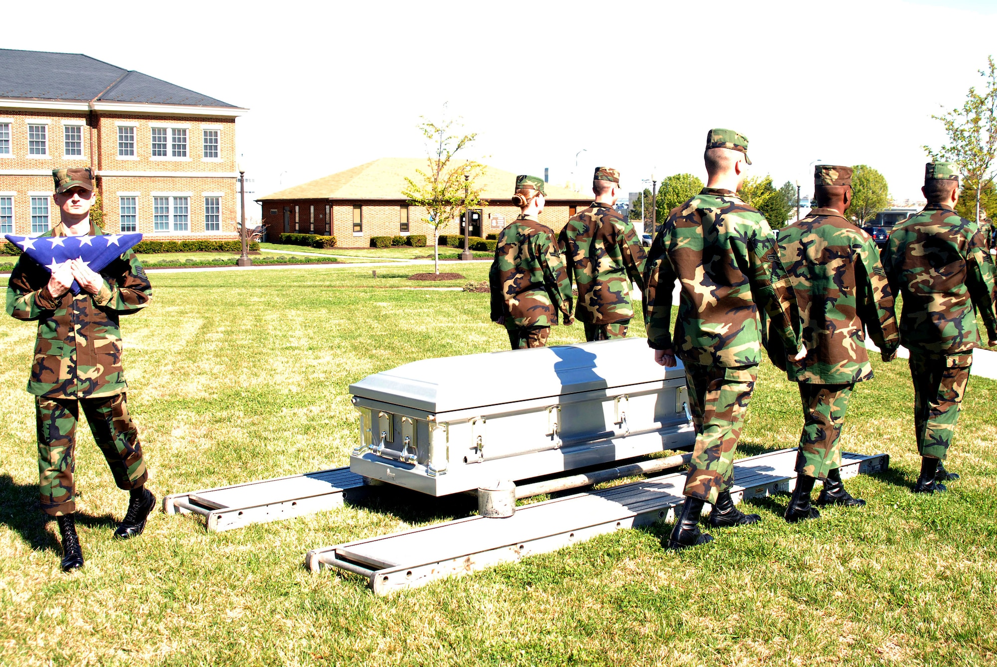 Airmen from the United States Air Force Honor Guard at Bolling Air Force Base, D.C., practice the newly implemented 7-person retiree funeral sequence.  The new sequence was implemented due to manpower shortages and a larger number of retiree funerals than ever before in Air Force history.  (U.S. Air Force photo/Senior Airman David Merrick)