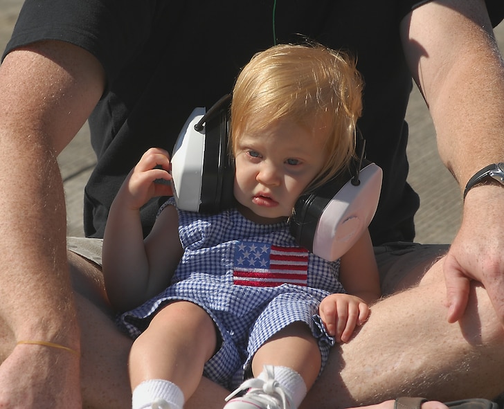 MOODY AIR FORCE BASE, Ga., -- A young spectator at the Team Moody AirFest 07’ is well prepared for the roar of jet engines during an aerial demonstration here Oct. 21.  Over 50,000 spectators attended the two-day event. (U.S. Air Force photo by Senior Airman Angelita Lawrence)