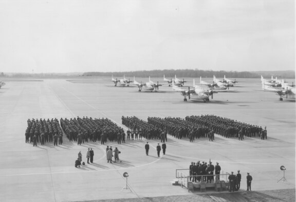 The 512th Troop Carrier Wing forms on the fightline at Willow Grove Air Reserve Station, Pa. in 1962, following demobilization from deployment to southern Florida in support of exercise Sun Shade II. Eight Air Force Reserve flying wings deployed to Florida to provide ready response to the mounting Cuban Missile Crisis. Initially slated slated for one year, the deployment ended early after only one month of active duty.