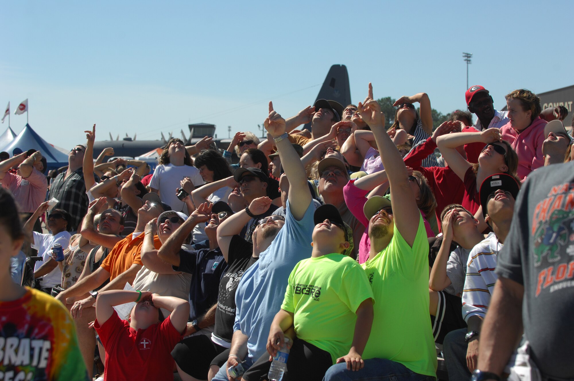 MOODY AIR FORCE BASE, Ga., -- The crowd at Team Moody AirFest 07’ looks overhead during an aerial demonstration here Oct. 21.  More than 50,000 spectators attended the two-day event. (U.S. Air Force photo by Senior Airman Angelita Lawrence)