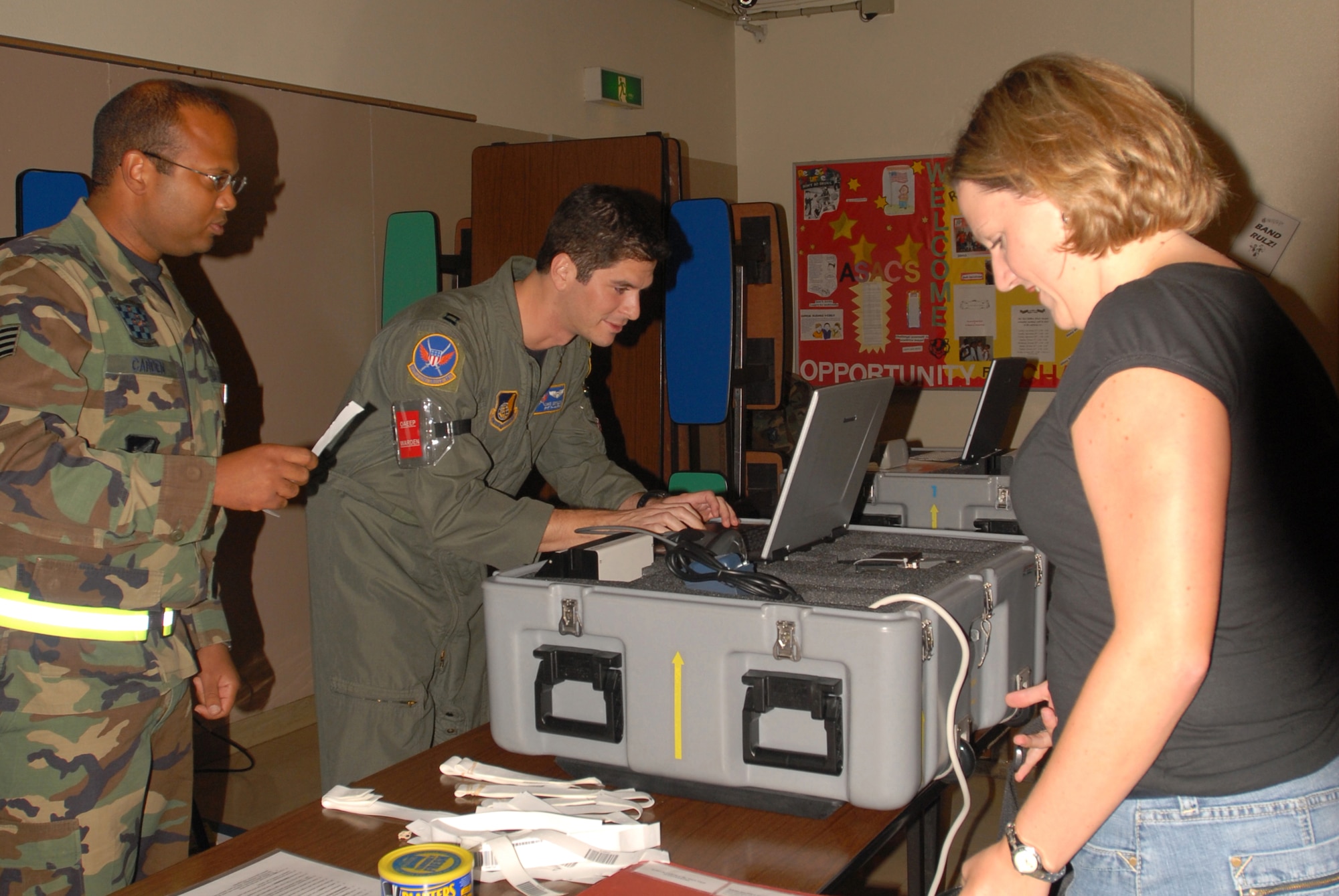 Amanda Bursaw, wife of Tech. Sgt. Curtis Bursaw, 18 Equipment Maintenance Squadron, has her information entered into the Noncombatant Evacuation Operation Tracking System (NTS) during a Noncombatant Evacuation Operation exercise held at Kadena Air Base, Japan, Oct. 20, 2007.  (U.S. Air Force Photo/Airman 1st Class Ryan Ivacic)