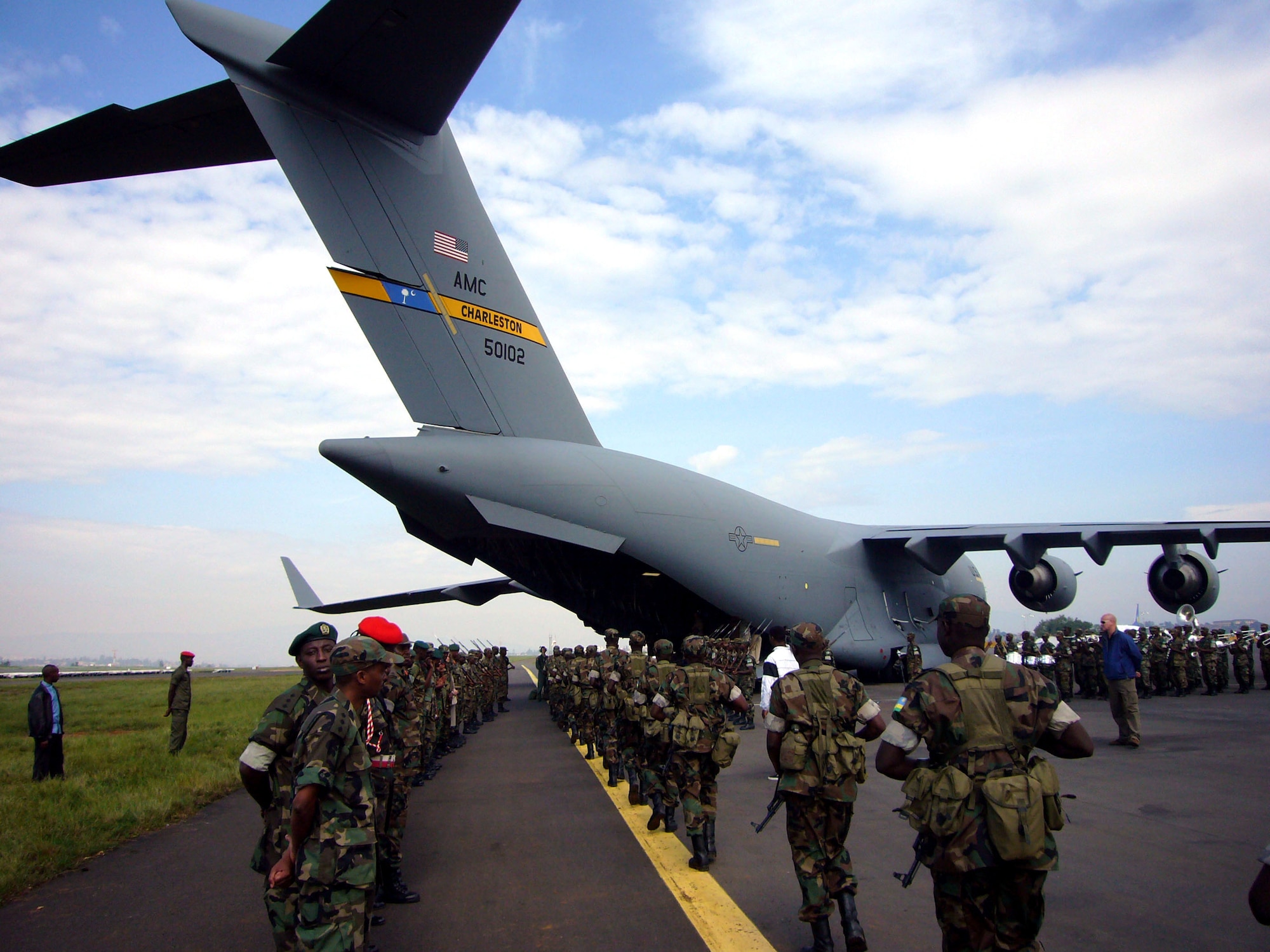 Rwandan soldiers march onto an Air Force C-17 Globemaster III Oct. 20 on their way to Darfur from Kigali, Rwanda. Airmen from Ramstein Air Base, Germany, and Charleston Air Force Base, S.C., are providing airlift support to the African Union effort in Darfur. (U.S. Air Force photo/Capt. Erin Dorrance) 

