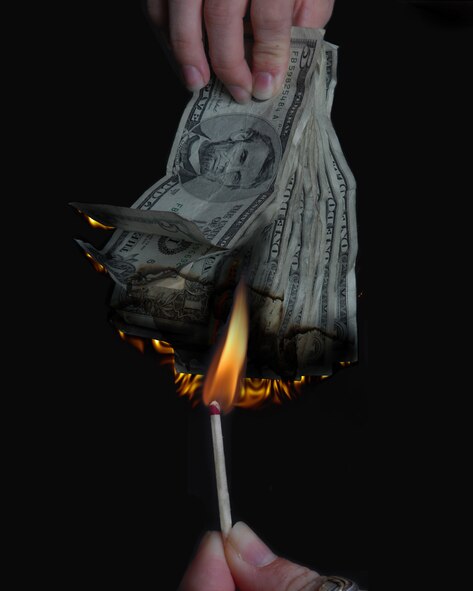 The Department of Defense implemented new legislation affecting all Airmen in an effort to ease some servicemembers financial issues.  The "Limitations on Terms of Consumer Credit Extended to Service Members and Dependents" legislation became effective Oct. 1, and restricts the terms of certain credit extensions to active duty members and their dependents.   (U.S. Air Force photo illustration by Senior Airman Angelita M. Lawrence)

