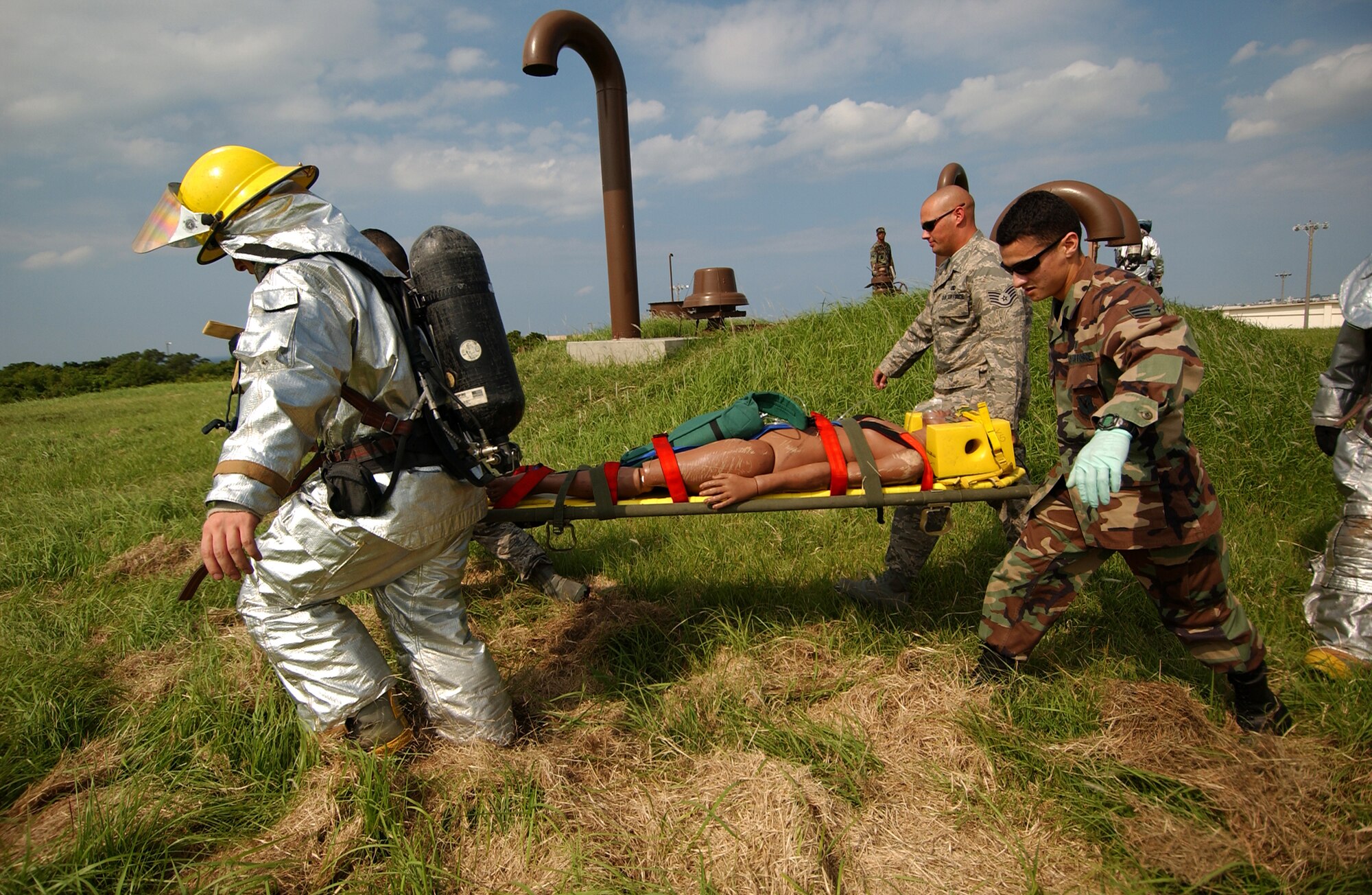 A scenario during the Local Operation Readiness Exercise here Oct. 22, brings all base agencies together. In the scenario based a gas explosion at a fuel farm caused injuries to several people.  (U.S. Air Force photo/Tech. Sgt. Rey Ramon)