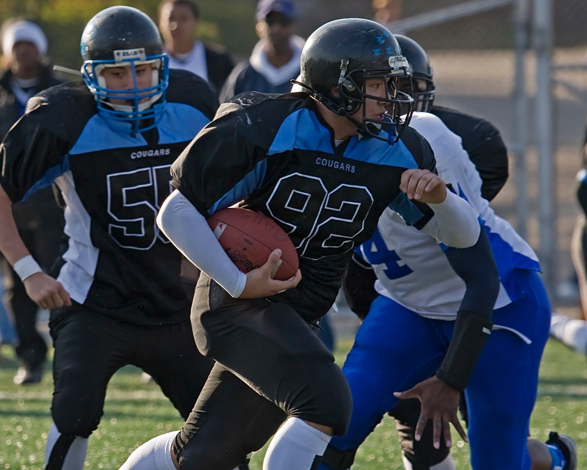 OSAN AIR BASE, Republic of Korea -- Mike Gilliam  No. 92 runs hard during a 24-0 lost Seoul American High School (SAHS) Falcons at Yongsan Garrison, Republic of Korea (U.S. Air Force photo by Master Sgt Benjamin Huseman) (Released)

