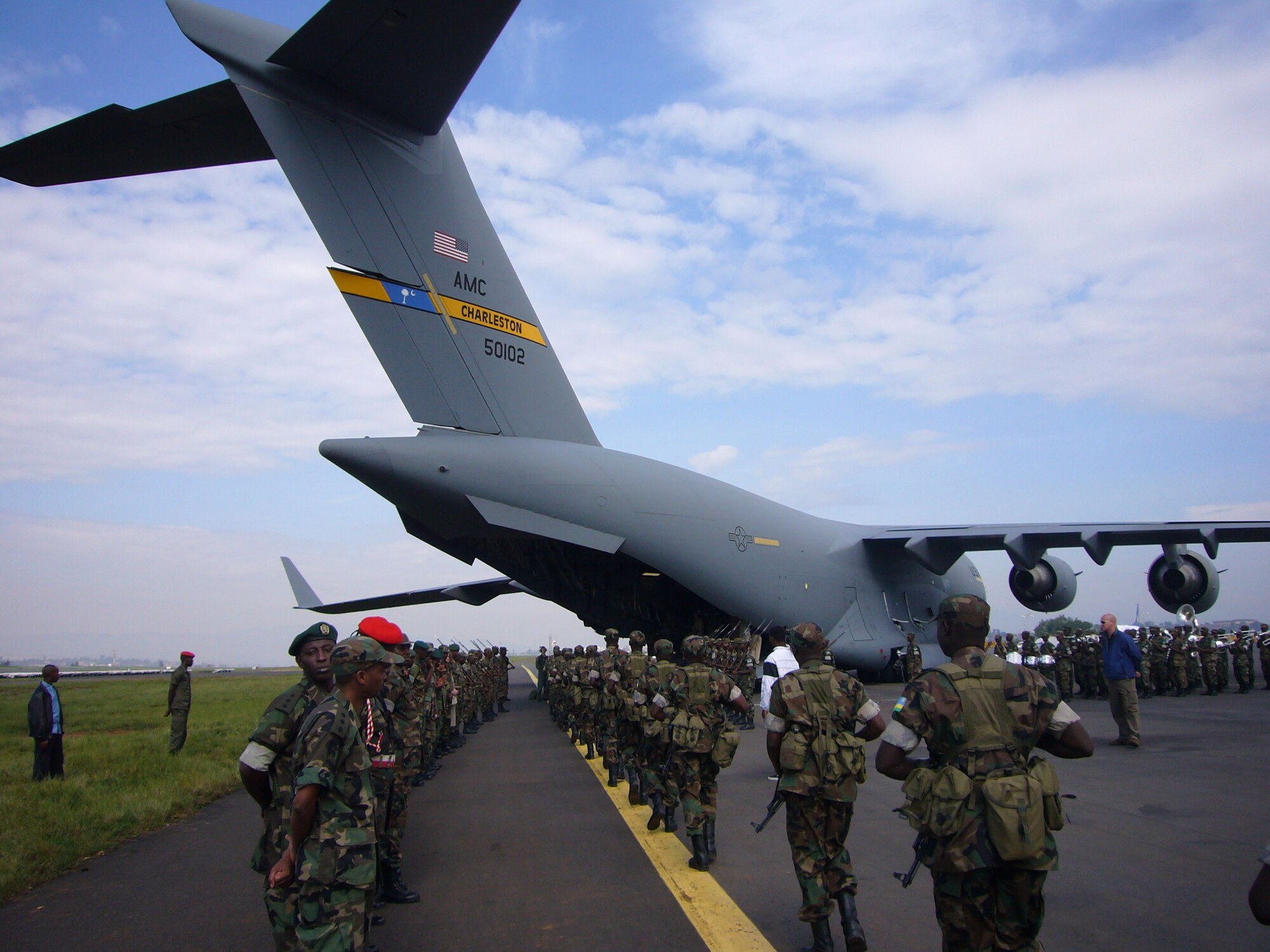 Rwandan Soldiers march onto a U.S. Air Force C-17 Oct. 20 on their way to Darfur.  Airmen from Ramstein Air Base, Germany, and Charleston Air Force Base, S.C., are providing airlift support to the African Union effort in Darfur.  

