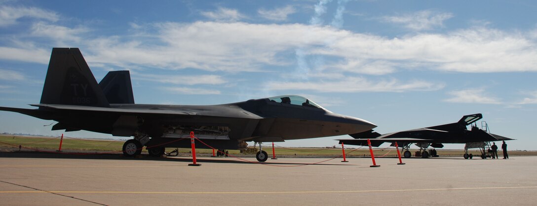 Old meets new as the Air Force's first-generation stealth fighter, the F-117A Nighthawk (right), sits next to its next-generation stealth fighter, the F-22A Raptor during Sheppard's 2007 Air Show and Open House Oct. 20. (U.S. Air Force photo/Airman 1st Class Jacob Corbin)