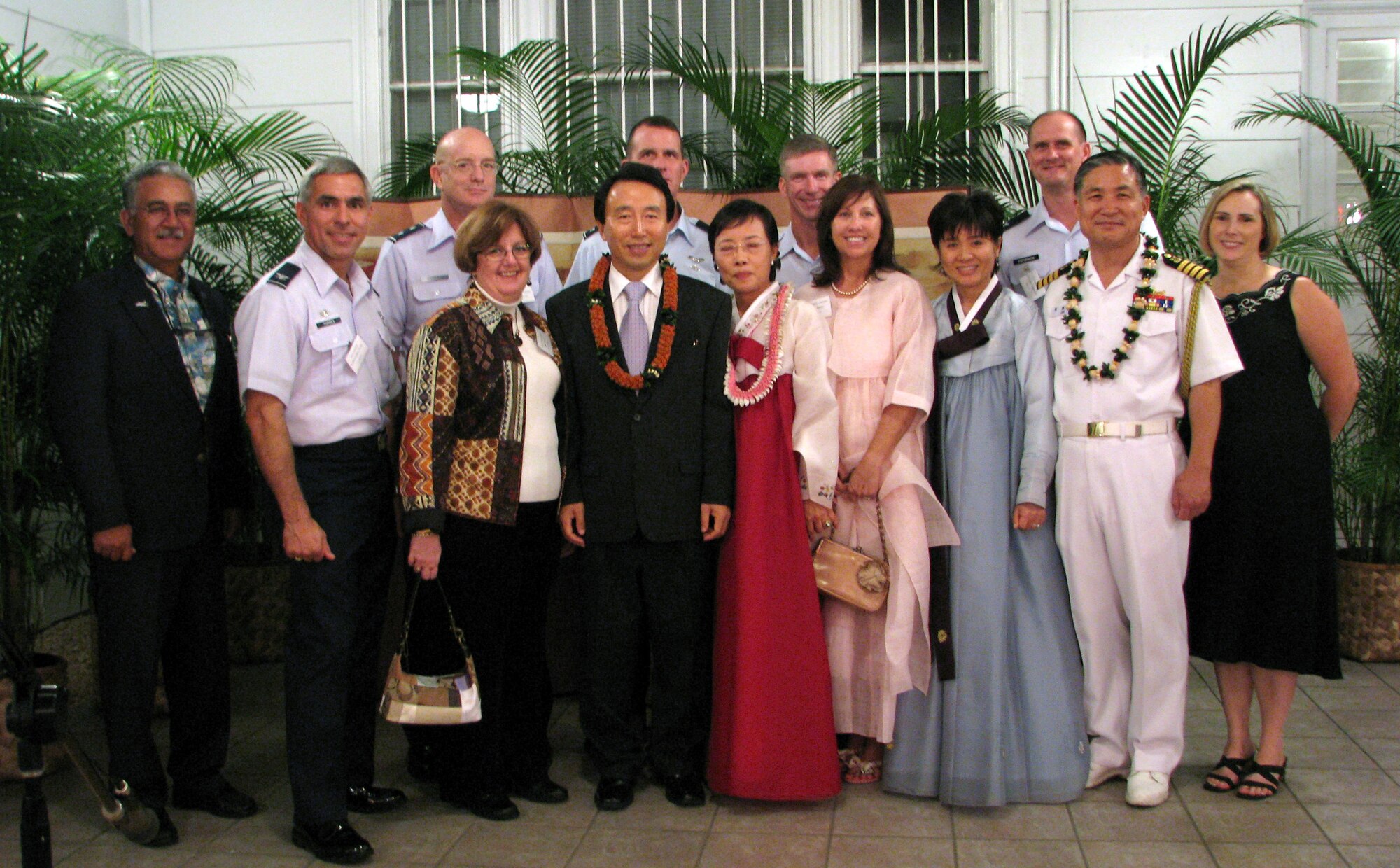 October is filled with many celebration days for Koreans.  One of the biggest celebration events is Oct 3, Armed Forces Day and National Foundation Day.   According to legend, the god-king, Tan-gun, founded the “Chosen Kingdom” in 2333 B.C.  This day fills citizens with nationalistic pride 5,000-year history of Korea.  

William Miller, 15th Logistics Readiness Squadron dispatch driver, Col. J.J. Torres, 15th Airlift Wing Commander, Maj. Gen, Richard Perraut Jr., 13th Air Force vice commander, Col. Colonel Martin Neubauer, PACAF/A2 Director of Intelligence, Maj. Gen. Jeffrey Remington, PACAF A3 Director of Air Space & Information Operations, Col. Jeffery Stephenson, 15th Airlift Wing vice commander, Mrs. Remington, Mrs. Irene Torres, Mrs. Tina Stephenson and members of the Korean Consulate stop for a photo during a reception, Oct. 3. 