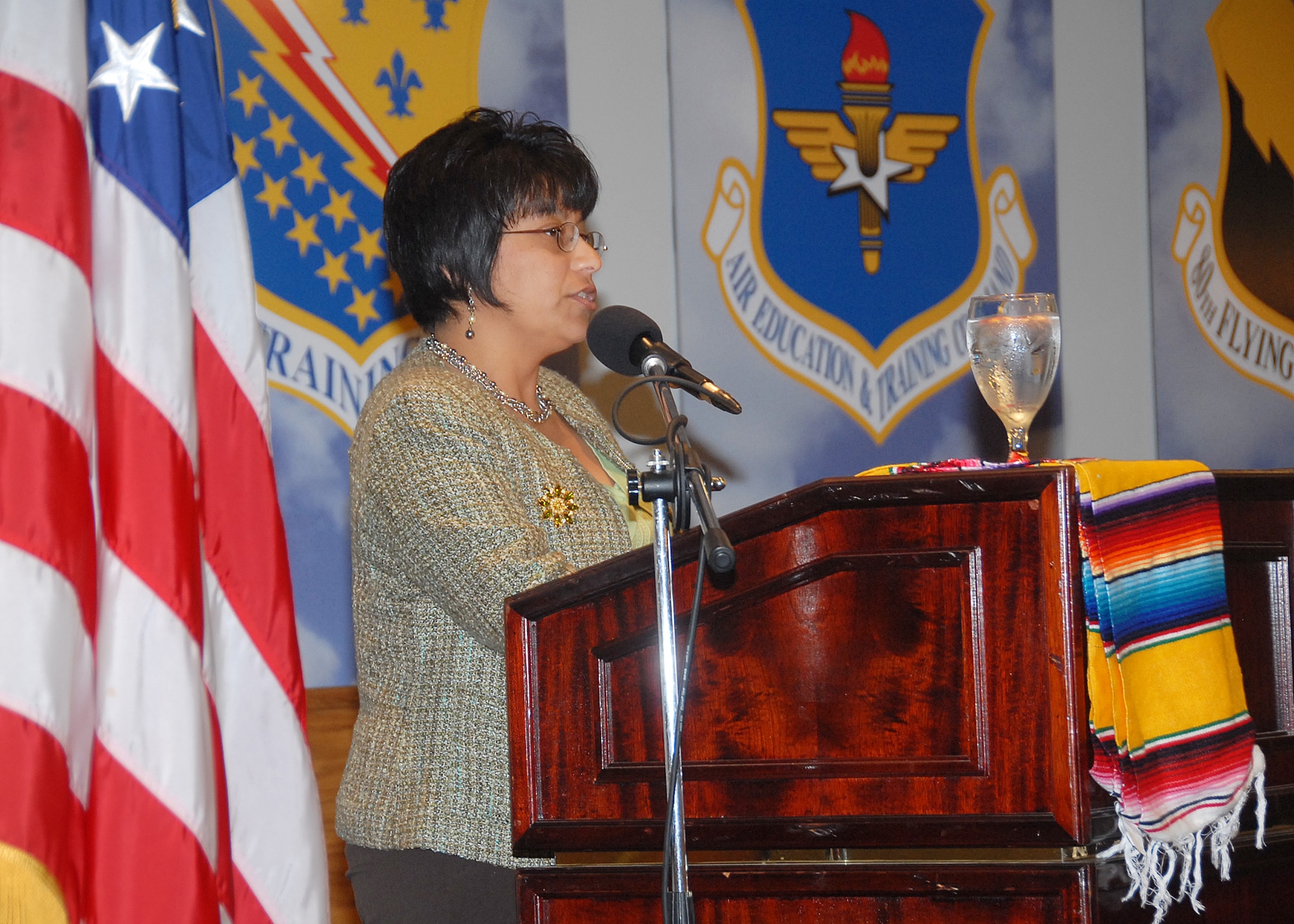 Lupita Ecoff, editor of “Despertad,” a local bi-lingual newspaper and member of the Sheppard Air Force Base Hispanic Heritage Committee, speaks at the Sheppard Hispanic Heritage Month Luncheon at the Sheppard Club Oct. 22. (U.S. Air Force photo/Mike Litteken)