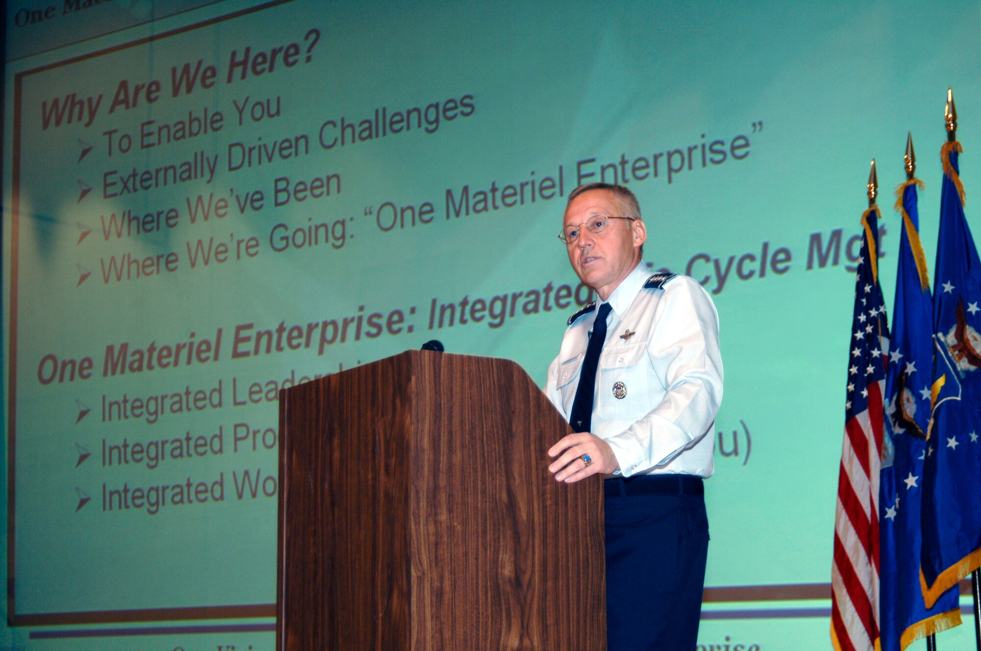 The commander of Air Force Materiel Command, Gen. Bruce Carlson, discusses ‘One Materiel Enterprise’ during an Oct. 19 commander’s call at the base theater on Wright-Patterson Air Force Base, Ohio. (Air Force photo by Al Bright)