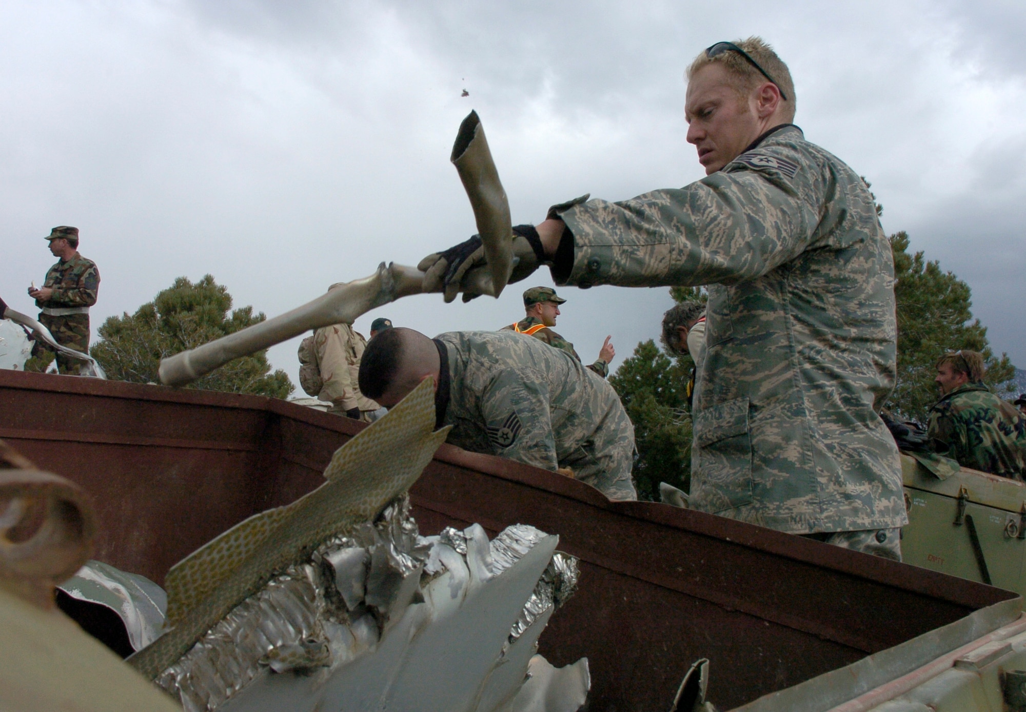 Staff Sgt. Benjamin Wilhelm, 775th Civil Engineer Squadron explosive ordnance disposal technician, verifies remains of the F-4 Phantom that crashed nearly 30 years ago are safe for handling.