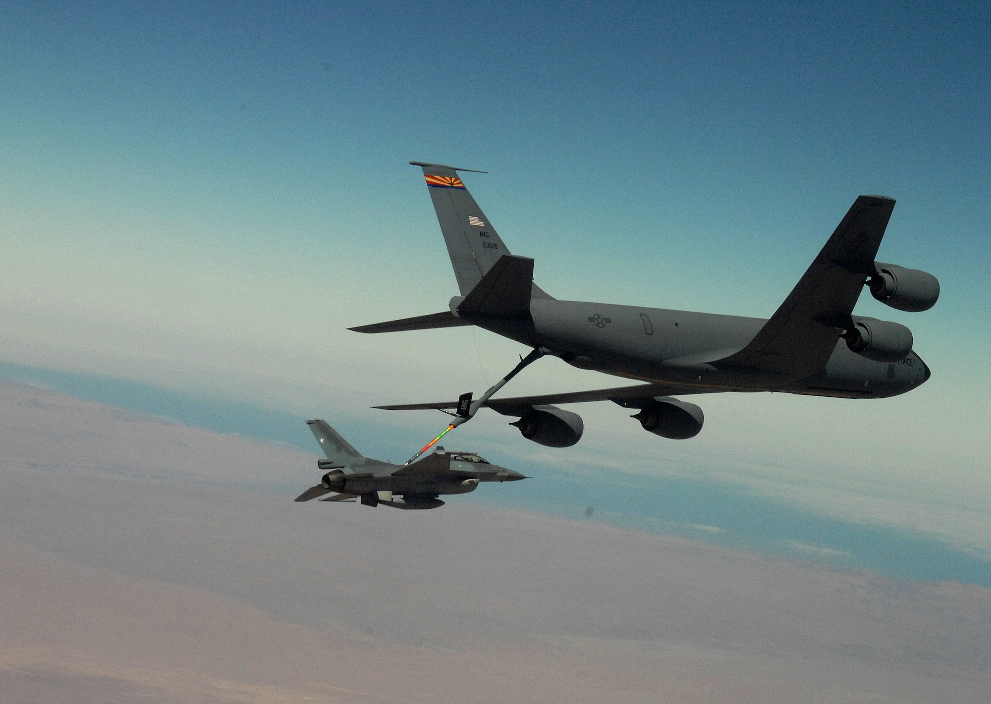 Arial refuelers, like this KC-135 Stratotanker refueling an F-16 Fighting Falcon, keep coalition aircraft in the fight to support operations Iraqi Freedom and Enduring Freedom .  On Oct. 21, aerial refueling crews flew 40 sorties and offloaded approximately 2.4 million pounds of fuel to 175 receiving aircraft. (U.S. Air Force photo/Master Sgt Bill Kimble)