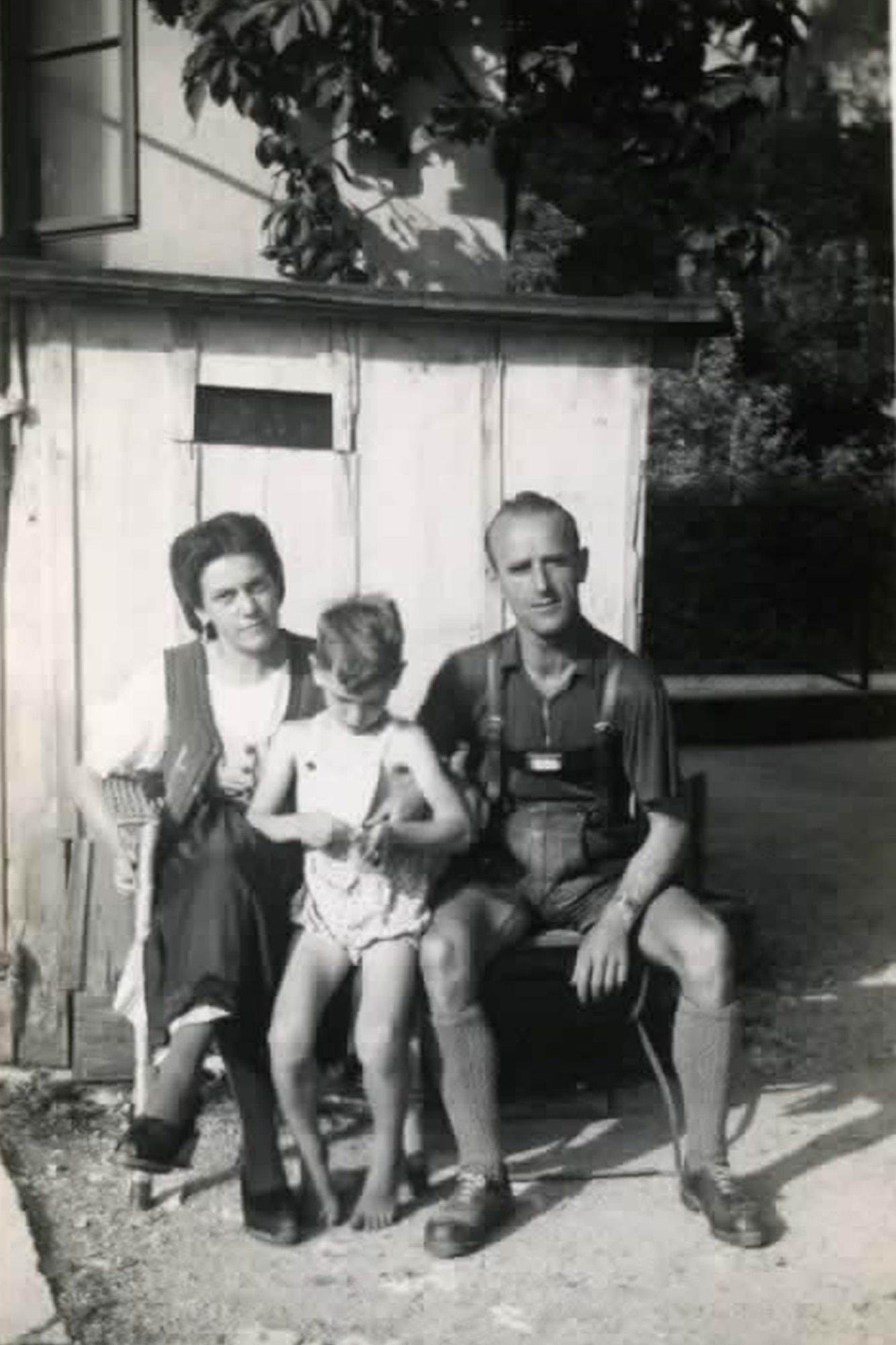 While moving through Austria with his Army unit,  the 139th Evacuation Hospital (Semi-Mobile.), Fred Kubli Jr. and his fellow soldiers would often spend time with Austrian families such as this family that were so grateful to see Americans come to help them. U.S. Air Force courtesy photo.