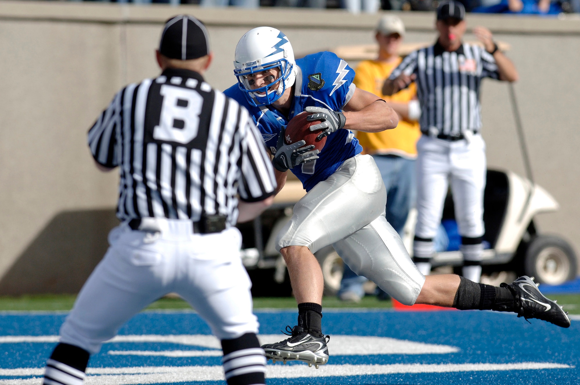 U.S. Air Force Academy Falcons wide receiver Mark Root catches a 25-yard touchdown pass in stride in the end zone during Air Force's 20-12 win over Wyoming Oct. 20 at Falcon Stadium in Colorado. Root is one of three Air Force players to catch a pass in all eight games this season. (U.S. Air Force photo/Mike Kaplan) 
