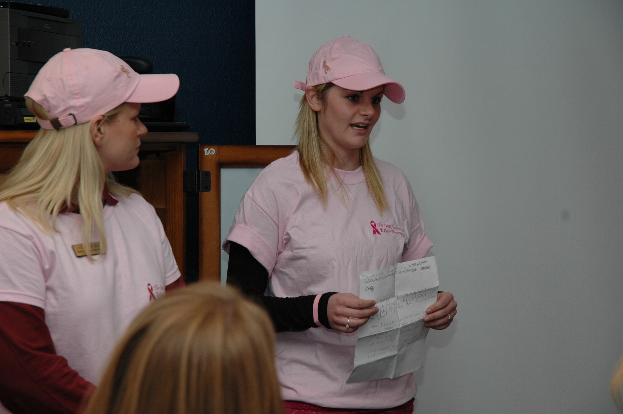 Jayme Blanton who was diagnosed with cancer at 13 years old, speaks about her experience and recovery during Ladies Night at the Health and Wellness Center Oct. 19. Ladies Night at the HAWC is an event focusing on women's health, as well as breast cancer awareness. (U.S. Air Force photo/ Airman 1st Class Emerald Ralston)
