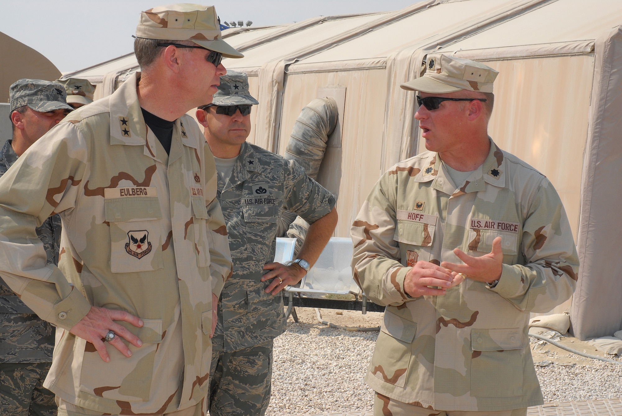SOUTHWEST ASIA ? Lt. Col. Robert Hoff, 379th Expeditionary Logistics Readiness Squadron commander, briefs Maj. Gen. Del Eulberg, Air Force Civil Engineer, and Brig. Gen. Timothy Byers, Director of Installations and Mission Support, on details of the readiness mission of the base during a tour Oct. 19 of the Millennium Village Building Project. (U.S. Air Force photo/Staff Sgt. Douglas Olsen)