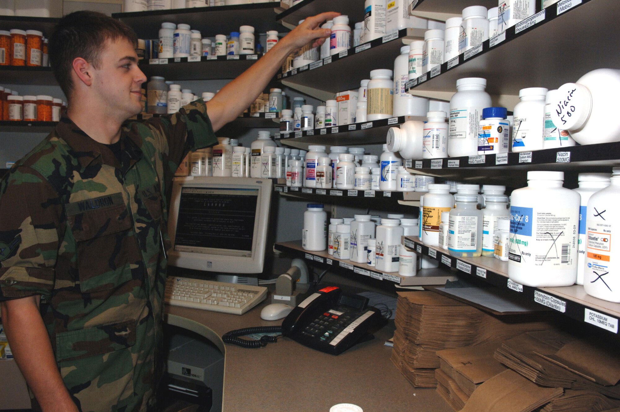 Airman Travis Waldron, 1st Special Operations Medical Operations Squadron, sorts through medicine at the Hurlburt Field Pharmacy recently. It is important to ask questions and understand prescriptions before taking them. (U.S. Air Force photo by Airman 1st Class Emily Moore)