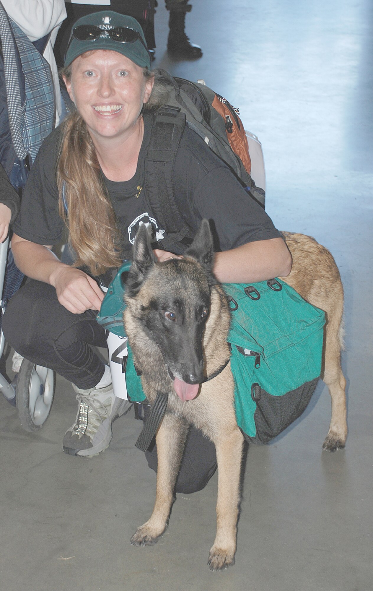 Pam Peterson and her dog, Soba, get ready to begin the Inaugural McGuire AFB Ruck March to help honor the Gold Star Mothers here Oct. 20. They competed in the civilian category, but Soba ran with a ruck of her own – filled with treats, water and things to help balance her out. (U.S. Air Force photo / Airman 1st Class Rebekah Phy)