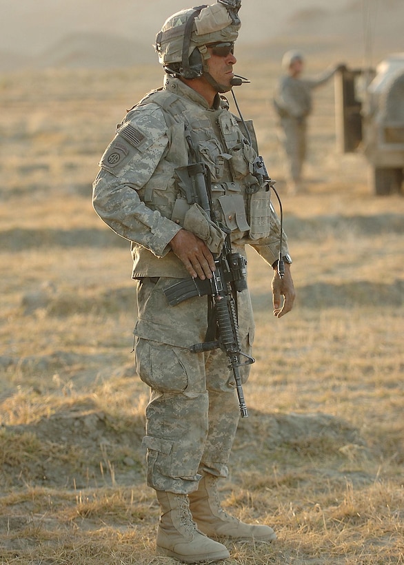 Army Sgt. Jim McKinzie, a mechanic, squad leader and truck commander in Headquarters and Headquarters Company, 782nd Brigade Support Battalion, 4th Brigade Combat Team, 82nd Airborne Division, pulls security when his convoy comes to a halt in Afghanistan’s Paktika province, Oct. 10, 2007. Photo by Spc. Micah E. Clare, USA