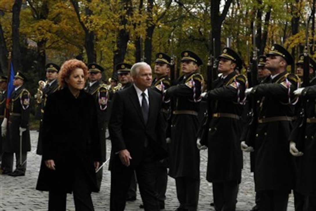 Czech Minister of Defense Vlasta Parkanova (left) and Secretary of Defense Robert M. Gates review the troops during an arrival ceremony at the Ministry of Defense in Prague, Czech Republic, on Oct. 23, 2007.  