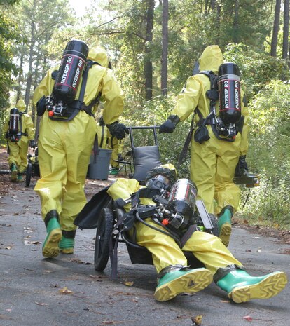 MARINE CORPS BASE CAMP LEJEUNE, N.C. (oCT. 27, 2007) - Marines with the 24th Marine Expeditionary Unit whell away a simulated casualty during the Enhanced Chemical Biological Radiologicaland Nuclear course here.