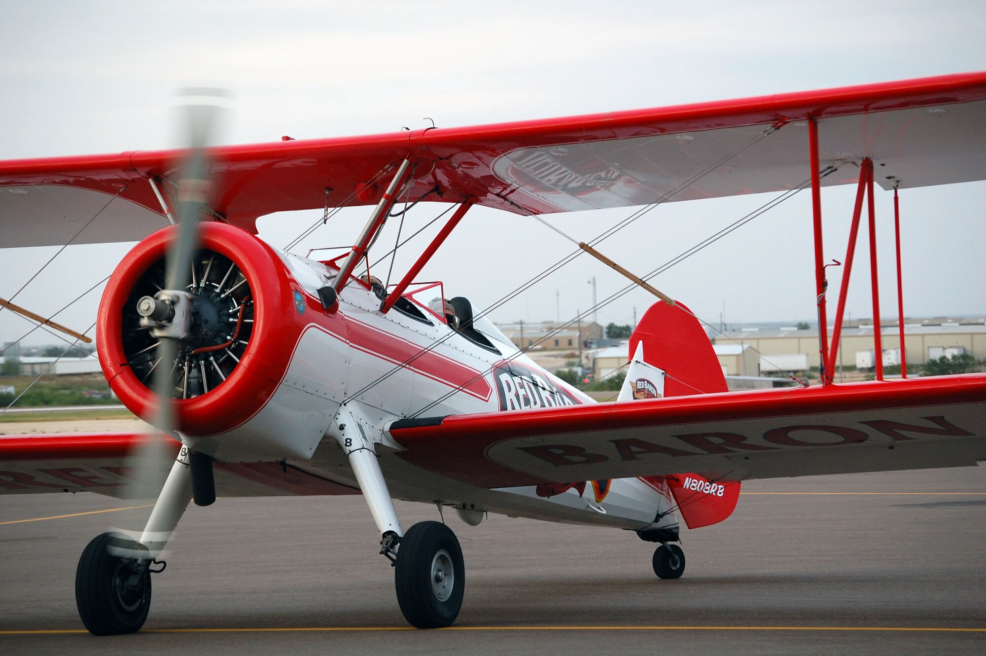 LAUGHLIN AIR FORCE BASE, Texas -- A Top achiever from Laughlin prepare to take off on there ride in a Stearman Biplane from the Red Baron Squadron Aerial Demonstration Team. "That was so awesome," said Staff Sgt. Amillia Gaytan, 47th Flying Training Wing, when asked about her ride. (U.S. Air Force photo by Airman Sara Csurilla)