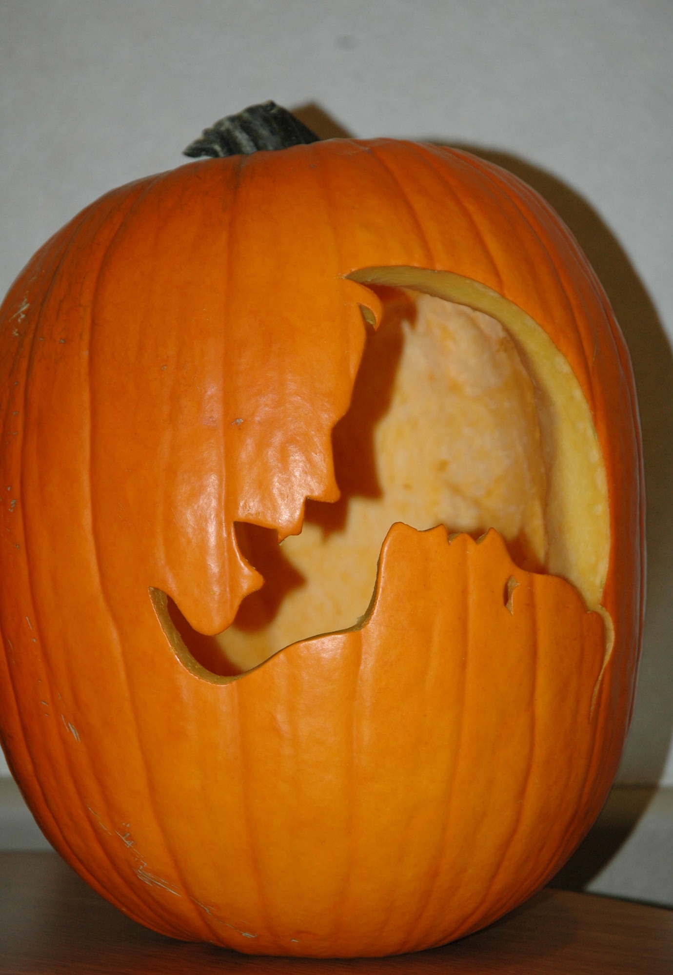 This pumpkin took first place in the 341st Logistics Readiness Squadron and 341st Civil Engineer Squadron dormitory pumpkin carving contest Oct. 19. It took Airman 1st Class Dayne Bertrand, 341st LRS vehicle operator, 45 minutes to carve the pumpkin, which is an optical illusion of a vampire attempting to bite a woman. Airman Bertrand received free tickets to the 341st CES haunted house for his efforts. (U.S. Air Force photo/Senior Airman Eydie Sakura).