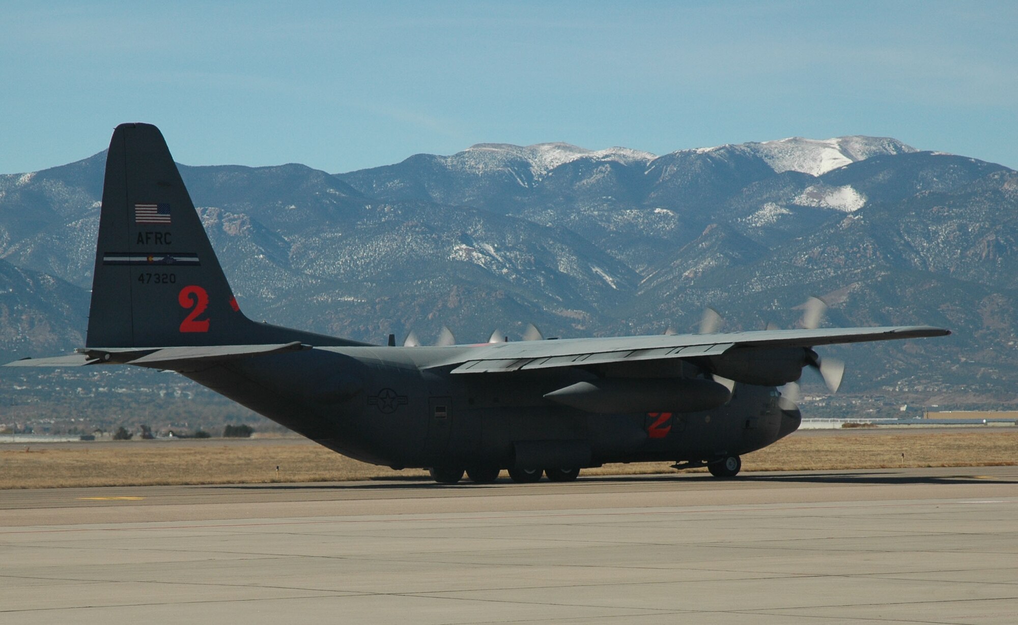 An Air Force Reserve C-130 equipped with the Modular Airborne Firefighting System departs Peterson Air Force Base, Colo., Oct. 23, 2007 en route to Point Mugu Naval Air Station, Calif.  The objective of the MAFFS program is to provide emergency capability to supplement the existing commercial airtanker support on wildland fires.
(U.S. Air Force photo/Maj. James R. Wilson) 