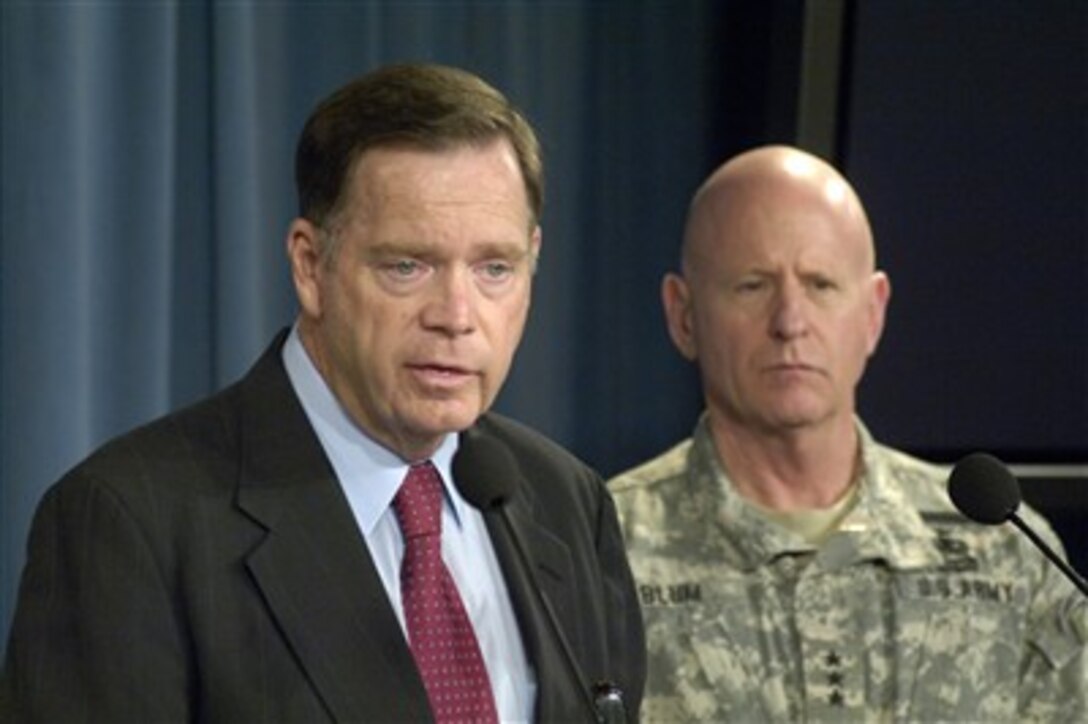 Assistant Secretary of Defense for Homeland Defense Paul McHale (left) and Chief of the National Guard Bureau Lt. Gen. H. Steven Blum conduct a Pentagon press conference to update reporters on the types of support being provided by the DoD to the state of California to helping them deal with the devastating wildfires sweeping through the southern part of the state on Oct. 23, 2007.  