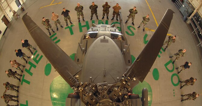 MOODY AIR FORCE BASE, Ga. – Helicopter maintainers of the 723rd Aircraft Maintenance Squadron gather around an HH-60G Pave Hawk combat search and rescue helicopter Oct. 25 here. Maintainers work long hours to prepare their aging aircraft for daily missions, all in support of their motto “These things we do…That others may live.” (U.S. Air Force photo/Airman 1st Class Brittany Barker) 