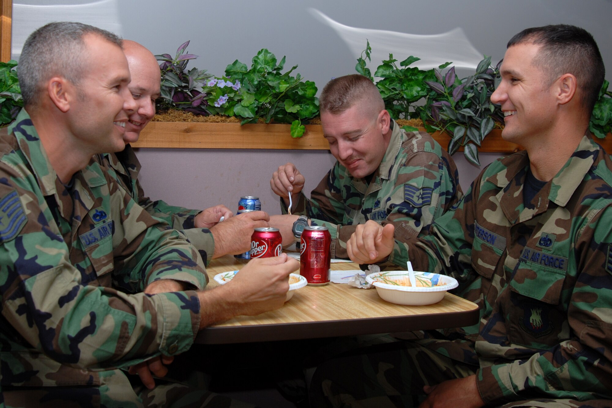 MCCONNELL AIR FORCE BASE, Kan. -- Members of the Maintenance Operations Group and customs looking for a home cooked lunch, spend their afternoon at the MOG Combined Federal Campaign Chili Cook-off taste testing different contestant’s chili Oct. 24. The CFC allows military members to participate in donating to more than 300 different non-profit organizations in the United States and internationally. (Photo by Airman Maria Ruiz)