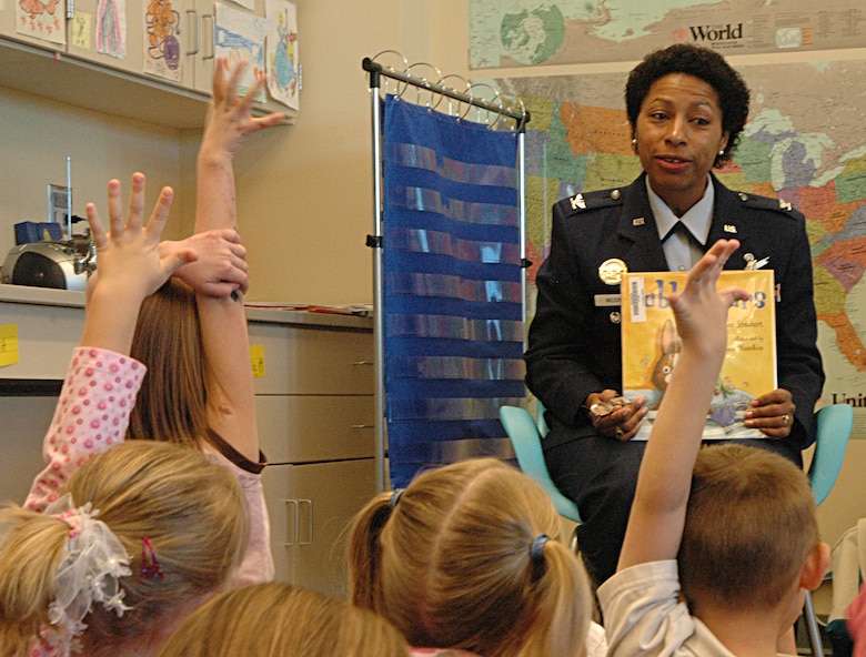 BUCKLEY AIR FORCE BASE, Colo. -- Col. Charlotte Wilson, 460th Space Wing vice commander, reads to a group of kindergarteners in Ms. Lindsey Davis’ class at Murphy Creek K-8 school. Colonel Wilson read "Rabbit Ears" to the children as part of the Leaders are Readers Program. On Oct. 24 and 25 books were the focus in Aurora Public Schools when students were matched with elected officials, city leaders and community members. (U.S. Air Force photo by Staff Sgt. Sanjay Allen)