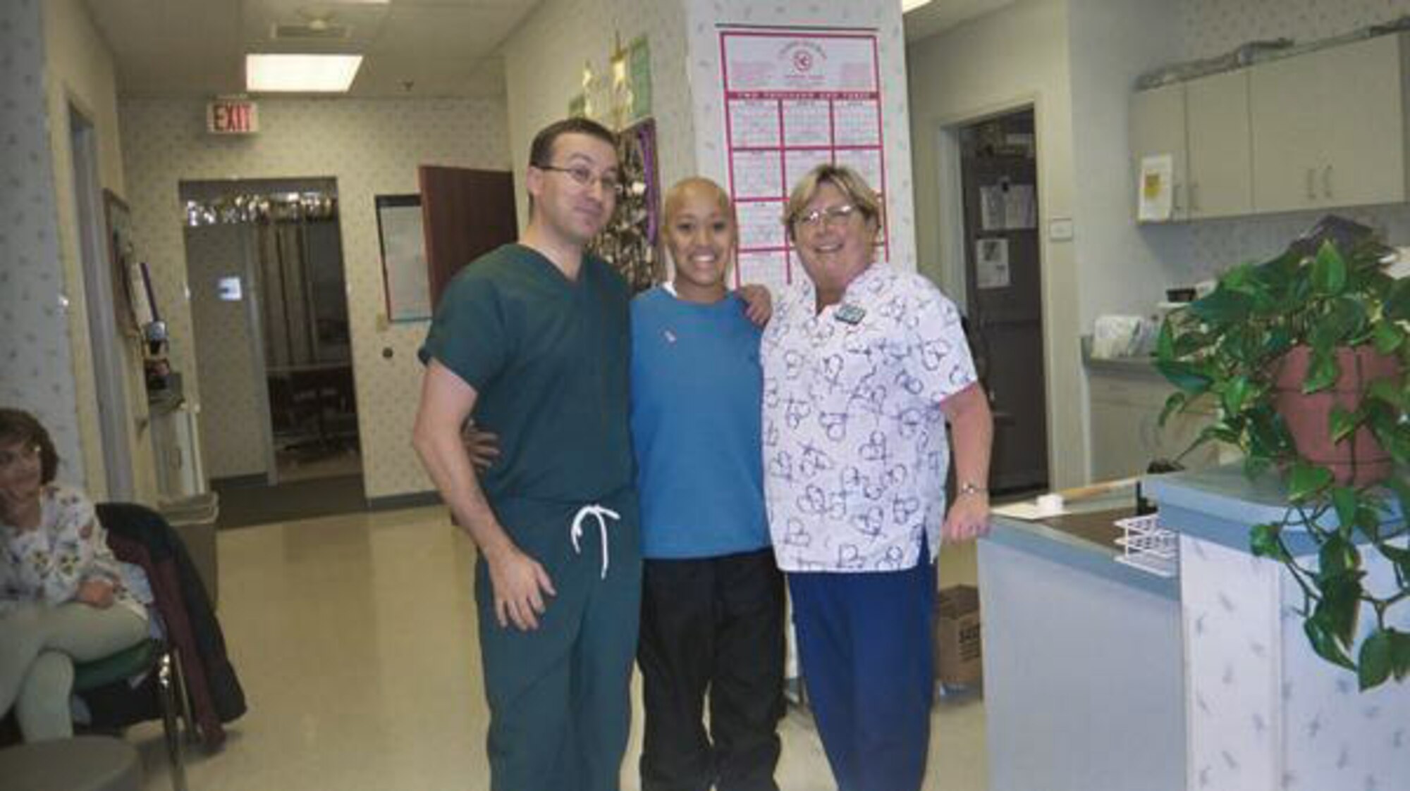Staff Sgt. Nicole McKinstry (middle) poses with her oncologist nurses, Dale and Linda, at the Pulaski Cancer Center in Virginia during her treatment for breast cancer. Sergeant McKinstry will be cancer-free for four years in December. Sergeant McKinstry is with the 43rd Aeromedical Dental Squadron at Pope Air Force Base, N.C. (Courtesy photo)
