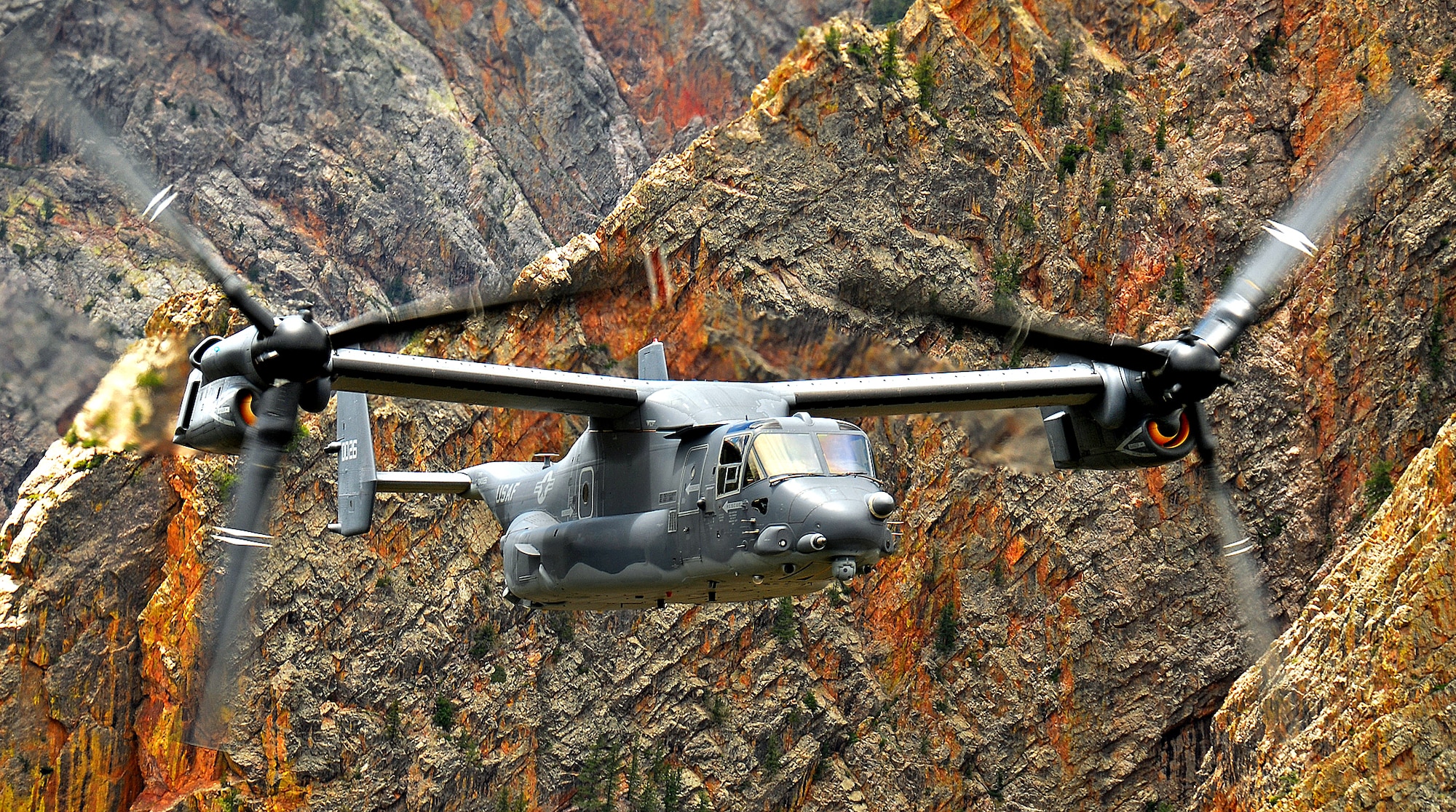 A CV-22 Osprey flies over the New Mexico and Colorado wilderness in August. The CV-22 participated in its first search and rescue mission Oct. 5 when a small civilian aircraft crashed. (U.S. Air Force photo/Staff Sgt. Markus Maier)
