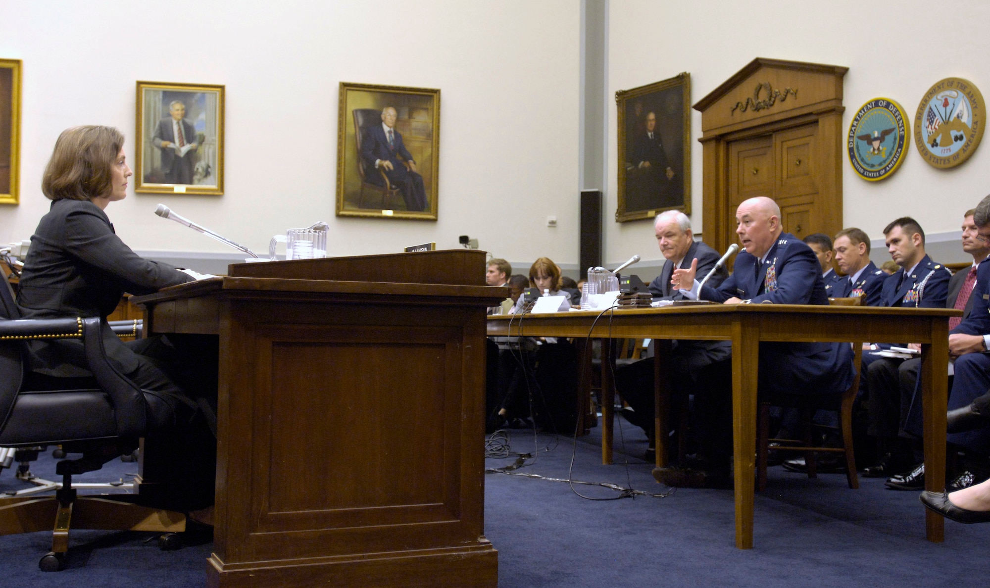 Secretary of the Air Force Michael W. Wynne (center) looks on as Air Force Chief of Staff Gen. T. Michael Moseley answers a question from U.S. Representative Kathy Castor, D-FL, (left) during a hearing of the House Armed Services Committee Oct. 24 in Washington. The Air Force senior leaders where on Capitol Hill to discuss Air Force strategic initiatives with congressional members. (U.S. Air Force photo/Master Sgt. Jim Varhegyi)
