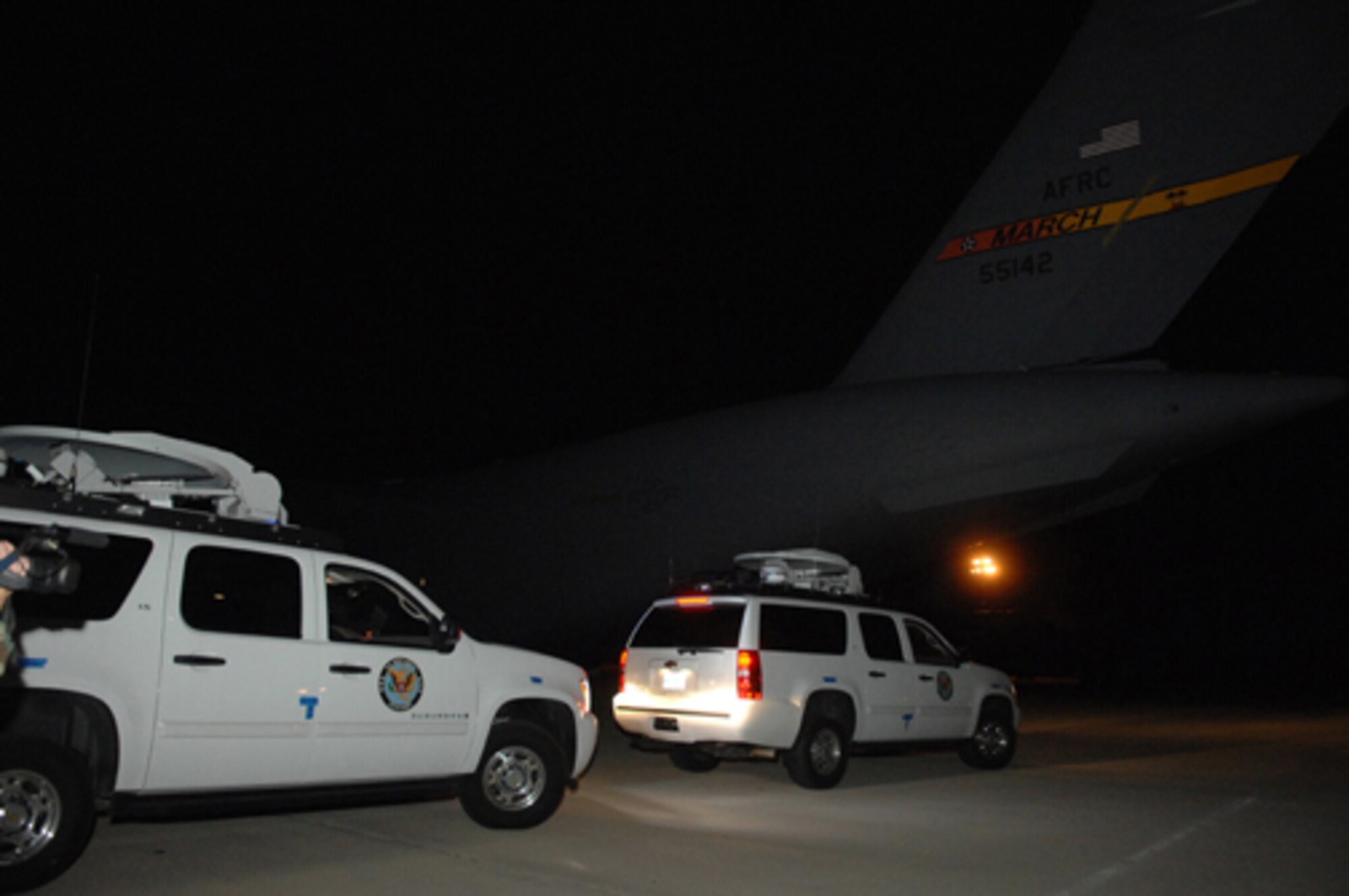 Federal Emergency Management Agency vehicles prepare to exit the flightline after being off-loaded from an Air Force Reserve Command C-17 Globemaster III aircraft at March Air Reserve Base, Calif., Oct. 24, 2007. (U.S. Air Force photo/Staff Sgt. Hector Garcia)