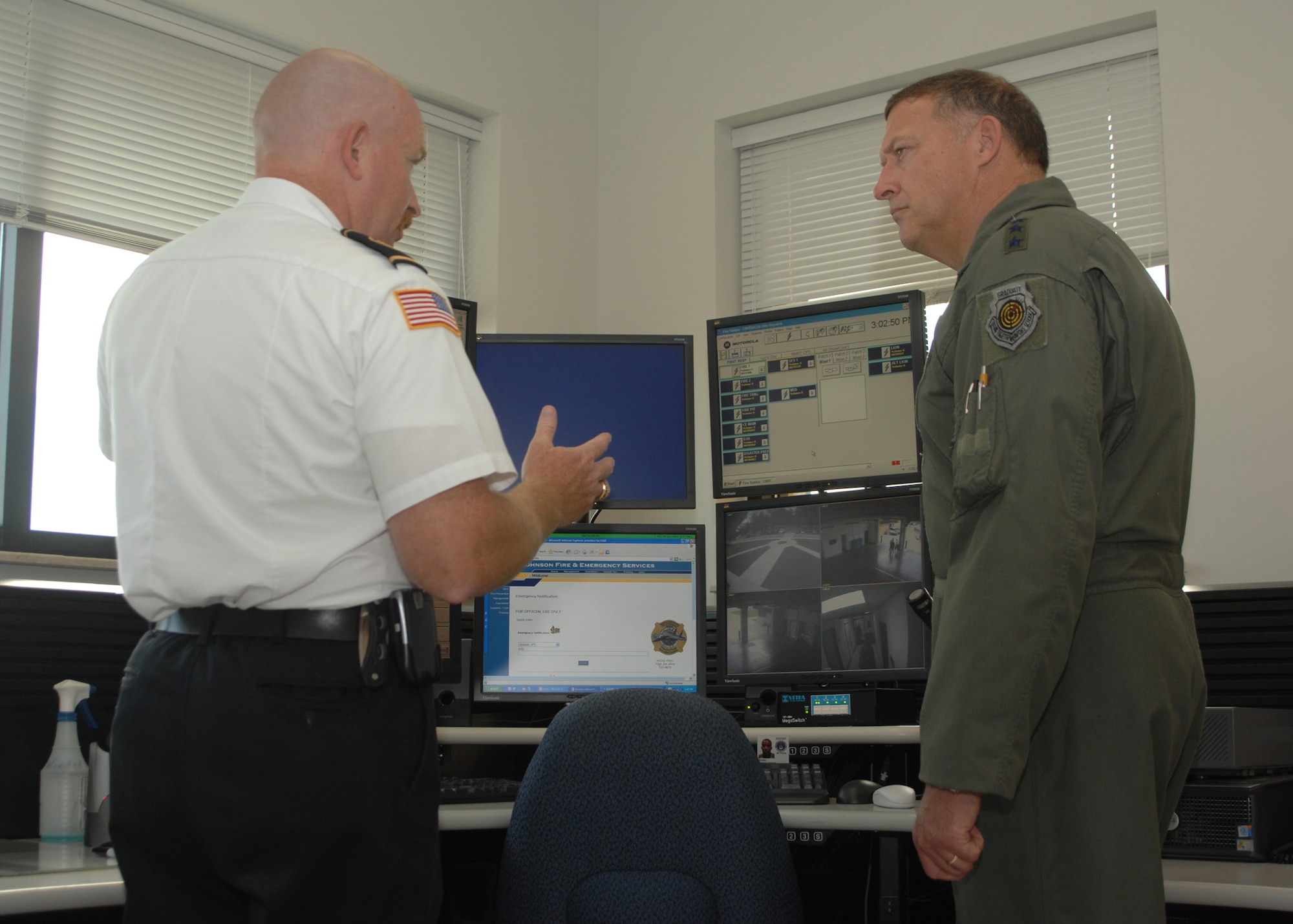SEYMOUR JOHNSON AIR FORCE BASE, N.C. - Tom Wade, Fire Chief, 4th Civil engineering Squadron, explains the surveillance systems around Seymour Johnson to Lieutenant General Gary L. North on October 19, 2007. Lieutenant General North is the Commander of the 9th Air Force and U.S. Central Command Air Forces. (U.S. Air Force photo by A1C Jonathon Williams)(released)
