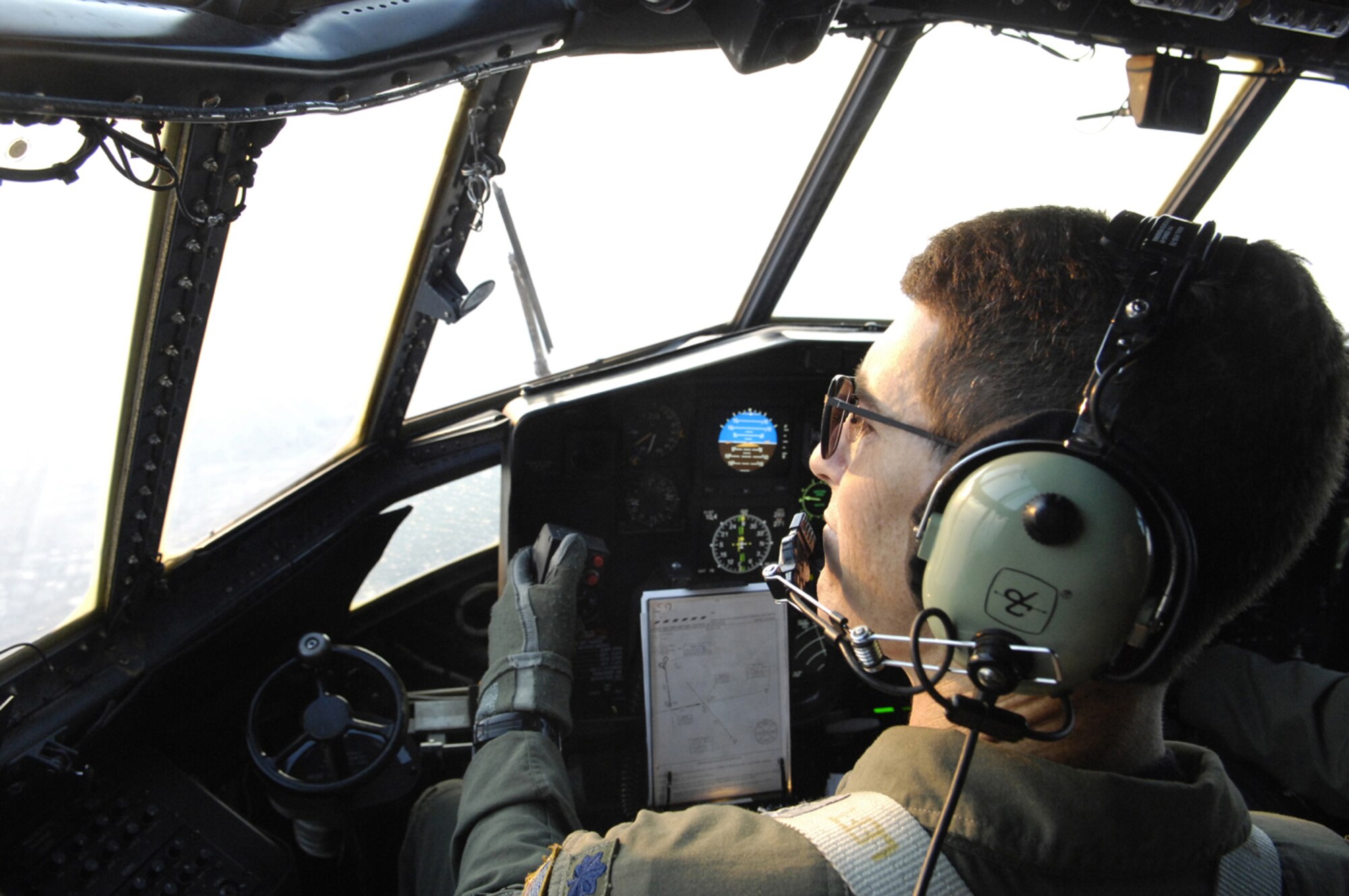 Lt. Col. Ted Treffeisen and his C-130 aircrew deploy 3,000 gallons of fire retardant over the Poomacha Fire in North San Diego County, Calif., Oct. 24, 2007. Colonel Treffeisen and his fellow reservists are from the 302nd Airlift Wing, Peterson Air Force Base, Colo. (U.S. Air Force photo/Tech. Sgt. Roy. A. Santana)
