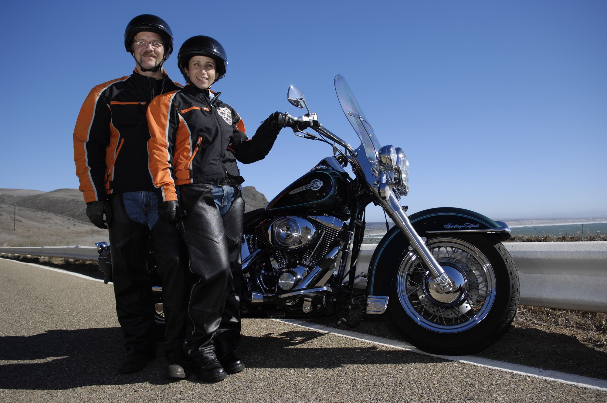 30th Space Wing Command Chief Master Sgt. Cari Kent poses with her husband, Larry, during a motorcycle ride down the Vandenberg AFB coastline .  (Photo By Staff Sgt. Denoris Mickle)