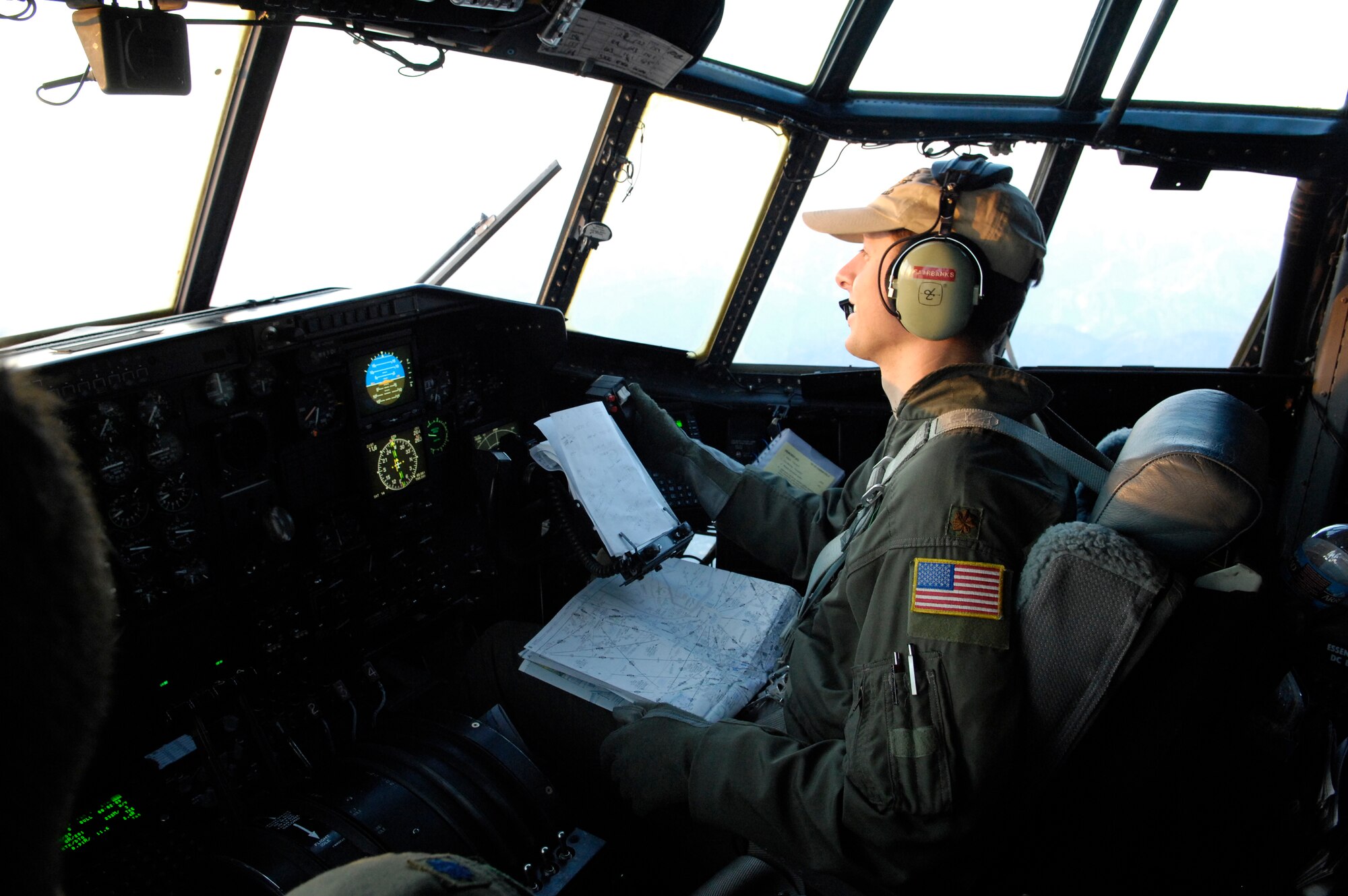 Maj. Robert Fairbanks is part of the C-130 Hercules aircrew deploying 3,000 gallons of fire retardant over the Poomacha fire Oct. 24 in North San Diego County, Calif. The C-130 and crew are assigned to the 302nd Airlift Wing from Peterson Air Force Base, Colo. The aircraft launched from Channel Islands Air National Guard Station, Calif. Air Force Reserve Command officials sent two of its designated firefighting C-130H3 aircraft to help battle the raging wildfires in Southern California. (U.S. Air Force photo/Tech. Sgt. Roy. A. Santana) 
