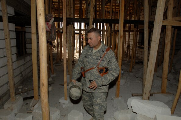 ALI AIR BASE, Iraq -- Capt. Rasul Alsalih, a project officer for the 732nd Expeditionary Civil Engineer Squadron, oversees construction projects by Iraqi nationals in an “in-lieu-of” tasking for the Army’s 20th Engineer Brigade. The captain was born in Iraq and fought against Saddam Hussein before being granted asylum in the U.S. and joining the Air Force. (U.S. Air Force photo/Airman 1st Class Jonathan Snyder)