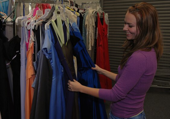 Katie Harris looks at gowns at the Airman and family readiness center Oct. 24.